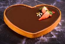 Load image into Gallery viewer, Heart shaped dark chocolate tart with fresh strawberry on top
